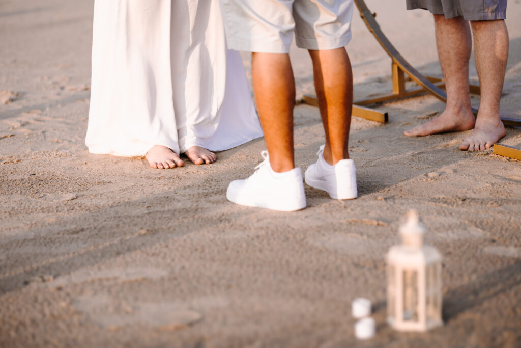 Couple getting married barefoot at a beach in NJ by EZ Elopements