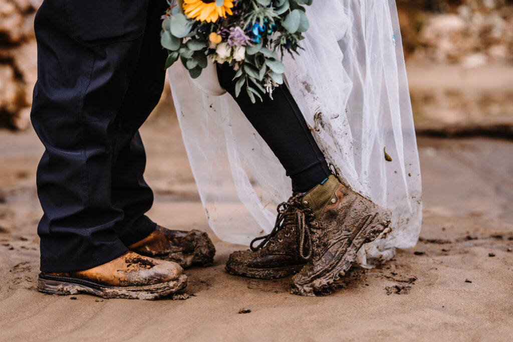 Couple in dirty boots on a fun elopement day in Iceland by EZ Elopements