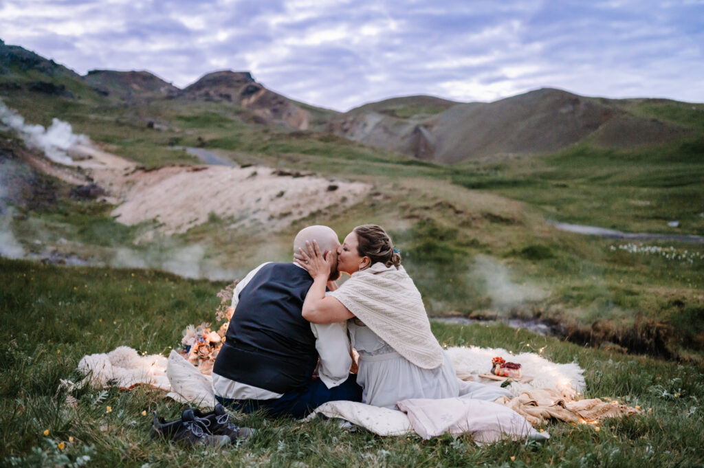 Romantic picnic celebration in the mountains of Iceland after a wedding ceremony by EZ Elopements